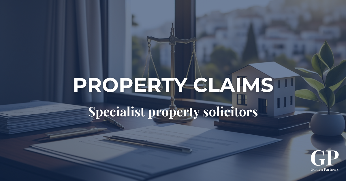 Legal desk with scales of justice, documents, and a house model symbolising expert legal support for property claims by specialist real estate solicitors.