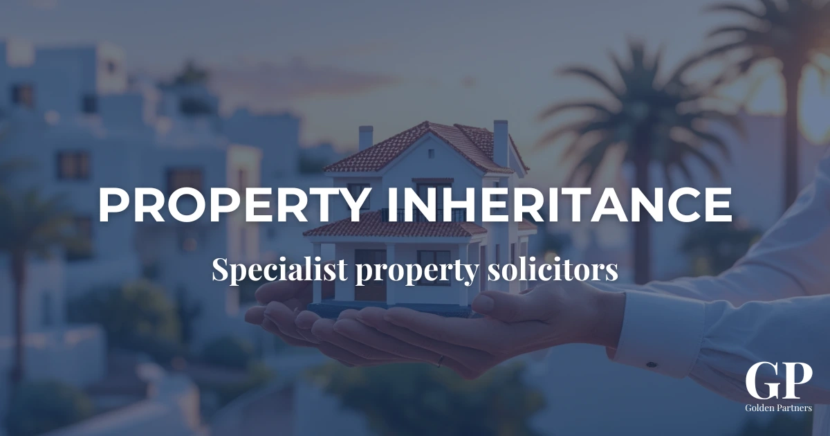Hands holding a miniature house representing property inheritance and legal management of inherited real estate.