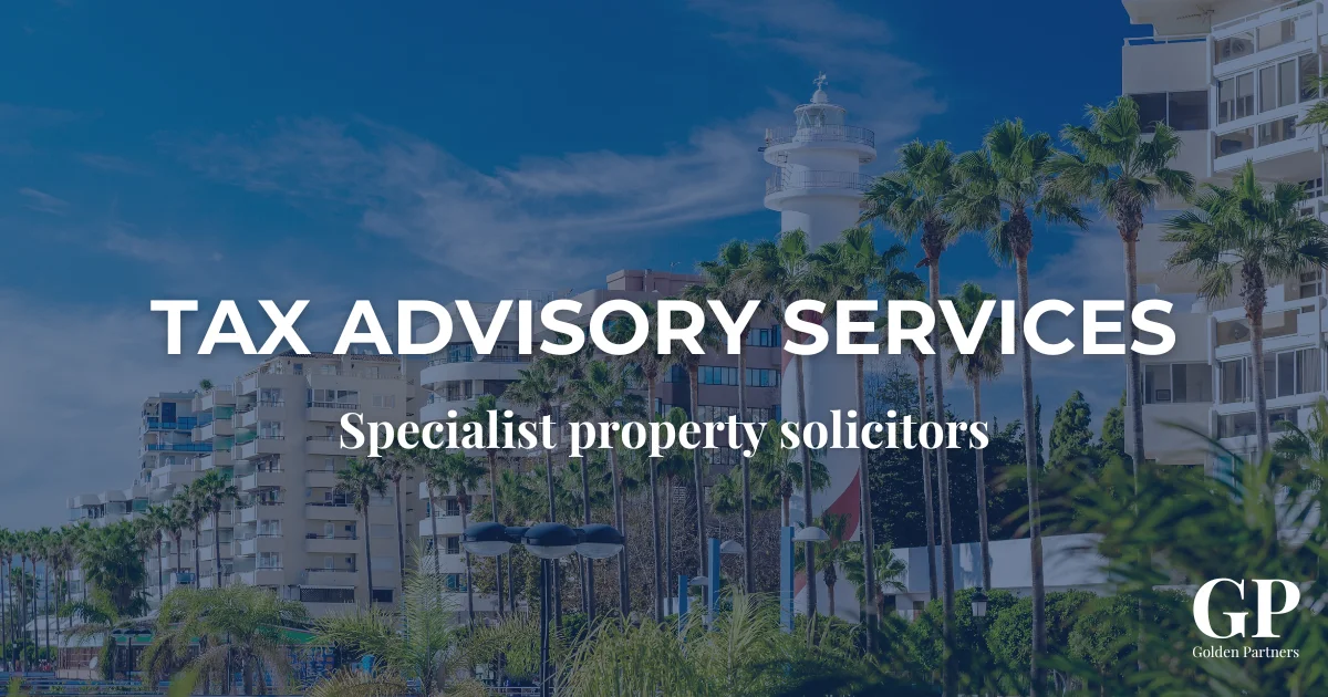 Cityscape with modern apartments, palm trees and a lighthouse in southern Spain illustrating tax advisory services in Spain offered by specialist property solicitors.